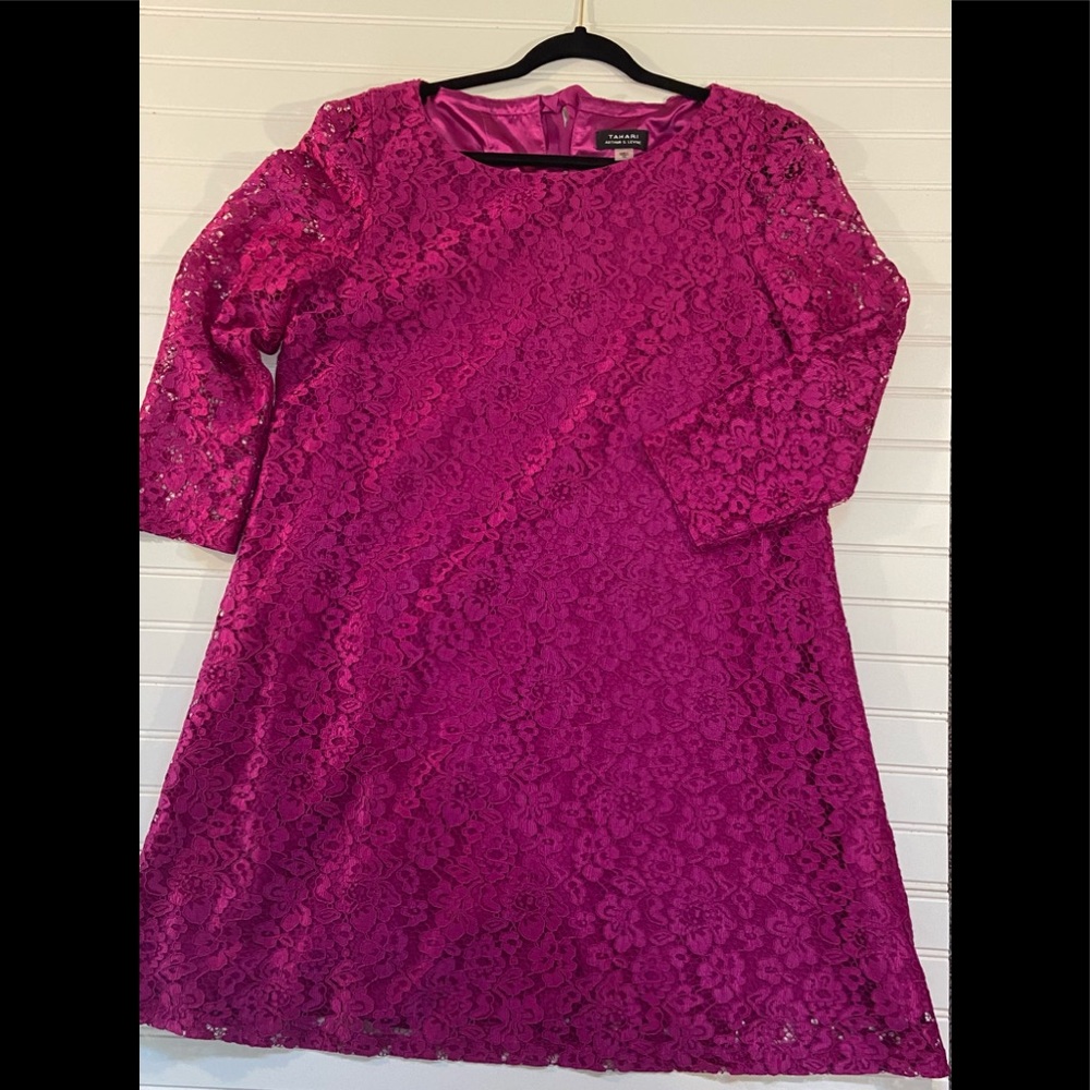 Tahari shiny purple bell shaped dress. Ribbon tie in back. Never worn.